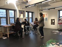 BAC Advisory board members Janet Dees and Ivy Wilson meeting with students in the BAC studio.