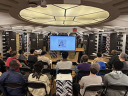 Former Artist-in-Residence Abraham Oghobase presenting a lecture in the Herskovitz Library of African Studies.